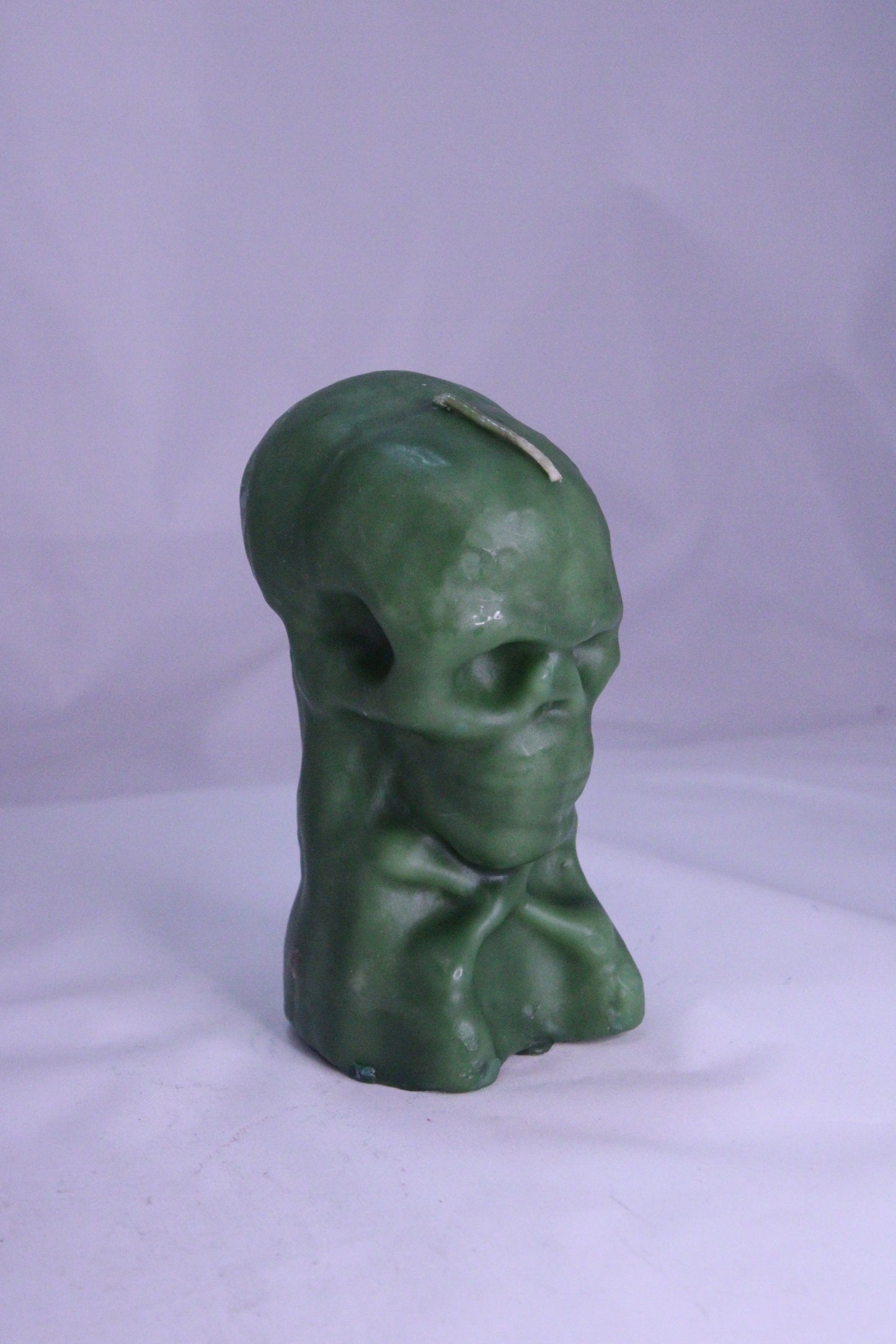 Skull Figure Candle Green