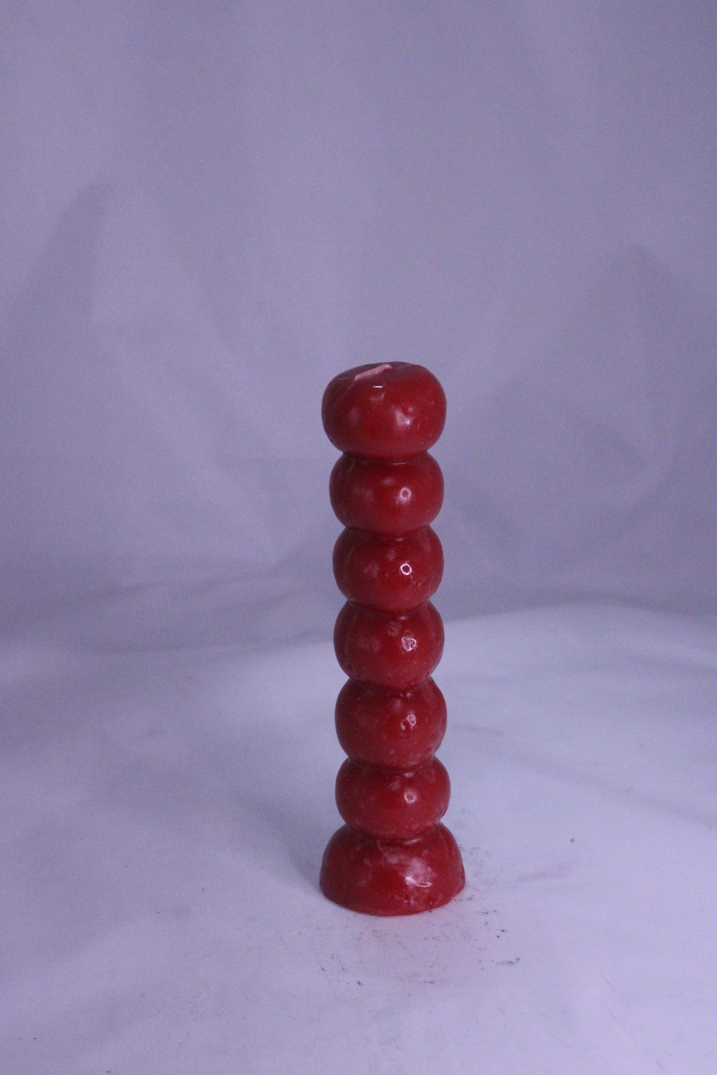 Red 7-Knob Candle