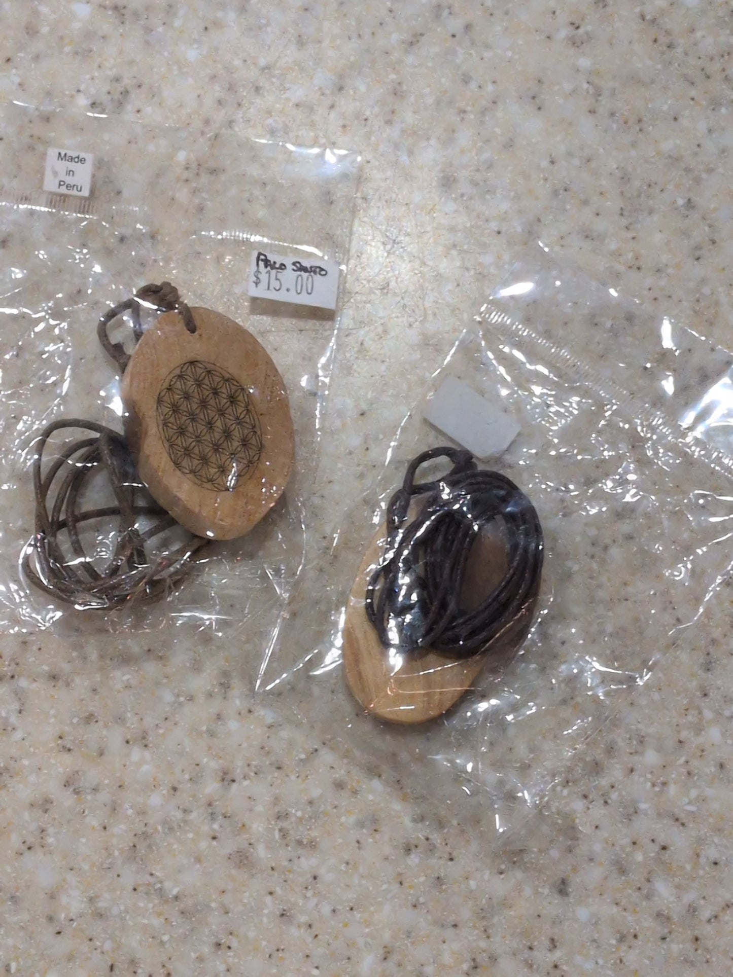 Palo Santo wood sacred geometry necklace w leather Cord