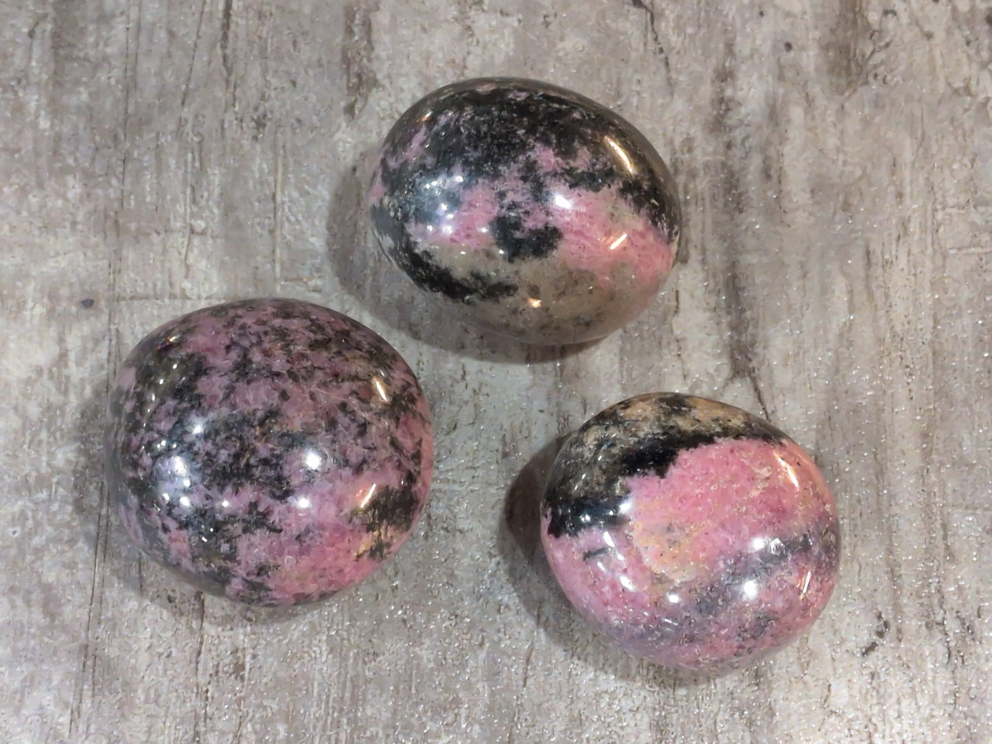 Rhodonite palm stone Priced Each