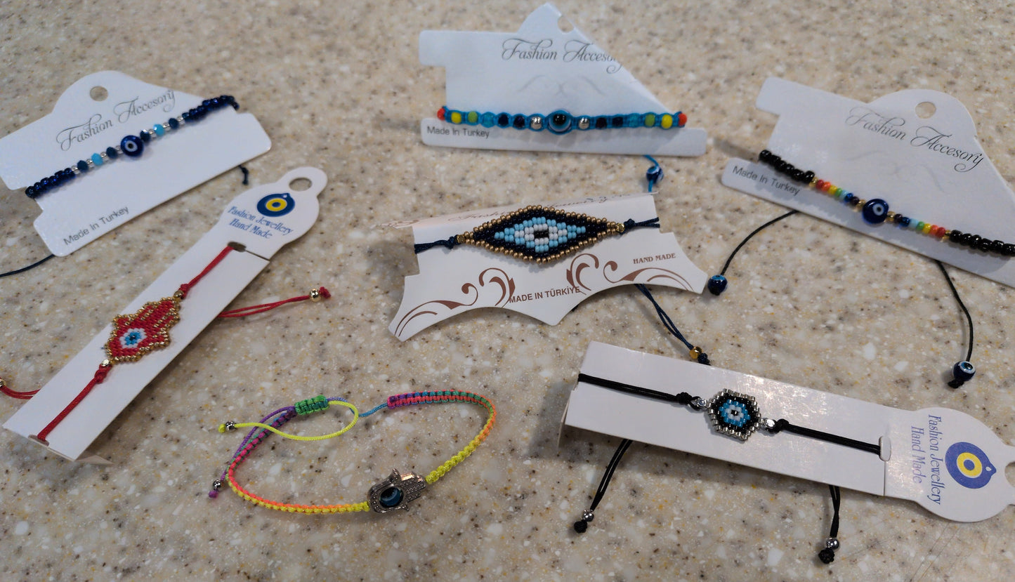 Assorted evil eye tension beaded bracelets