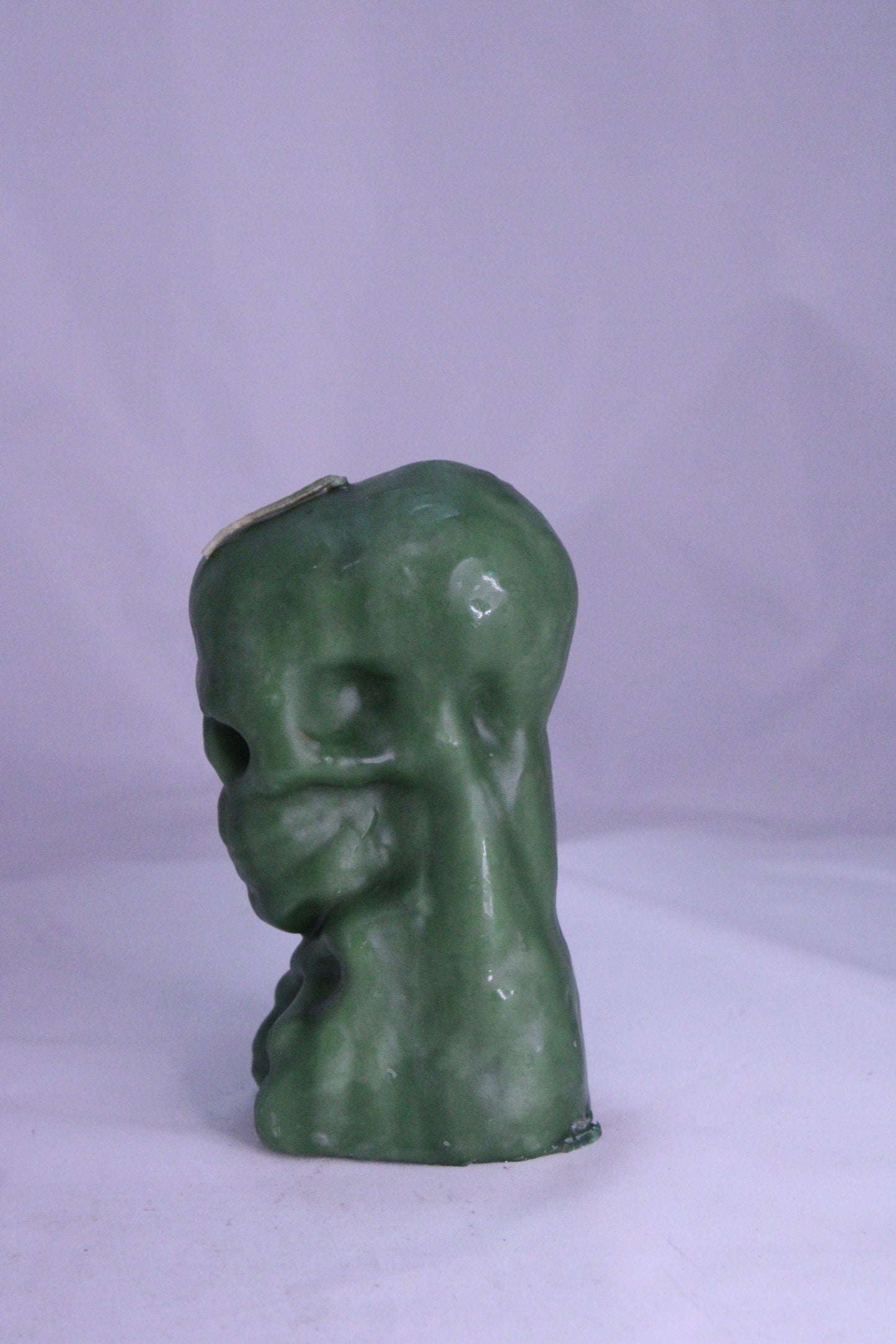 Skull Figure Candle Green