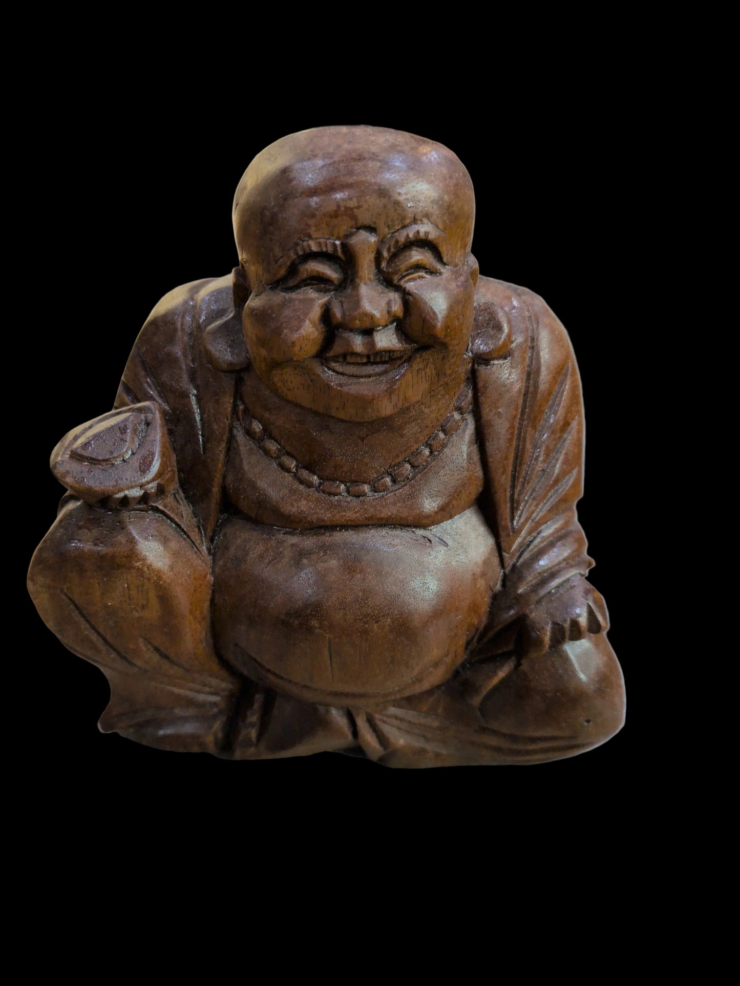 Small carved wooden Buddha