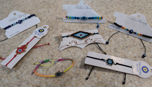 Assorted evil eye tension beaded bracelets