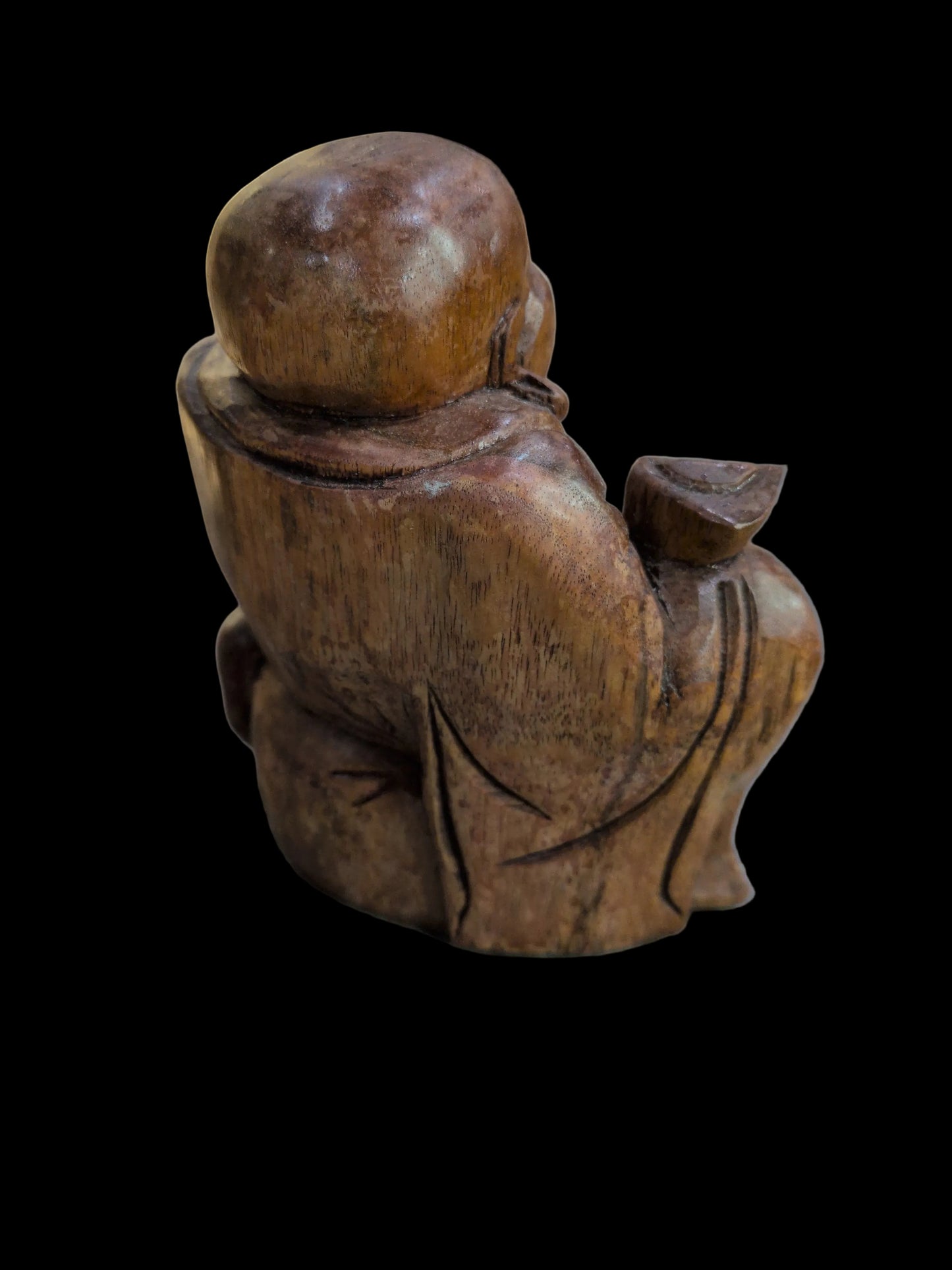 Small carved wooden Buddha