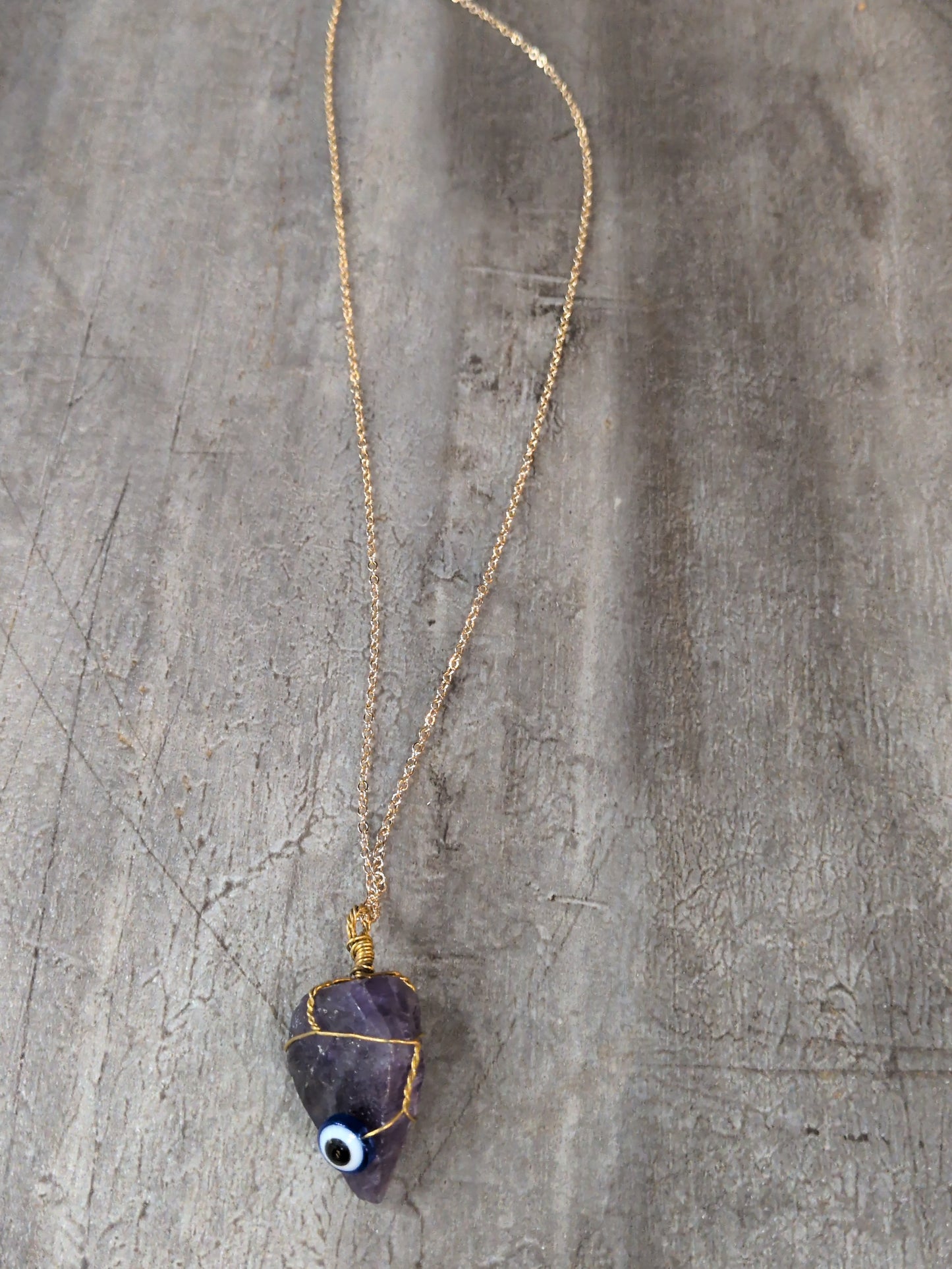 Wire wrapped Amethyst crystal Evil Eye Pendant w/gold metal plated chain