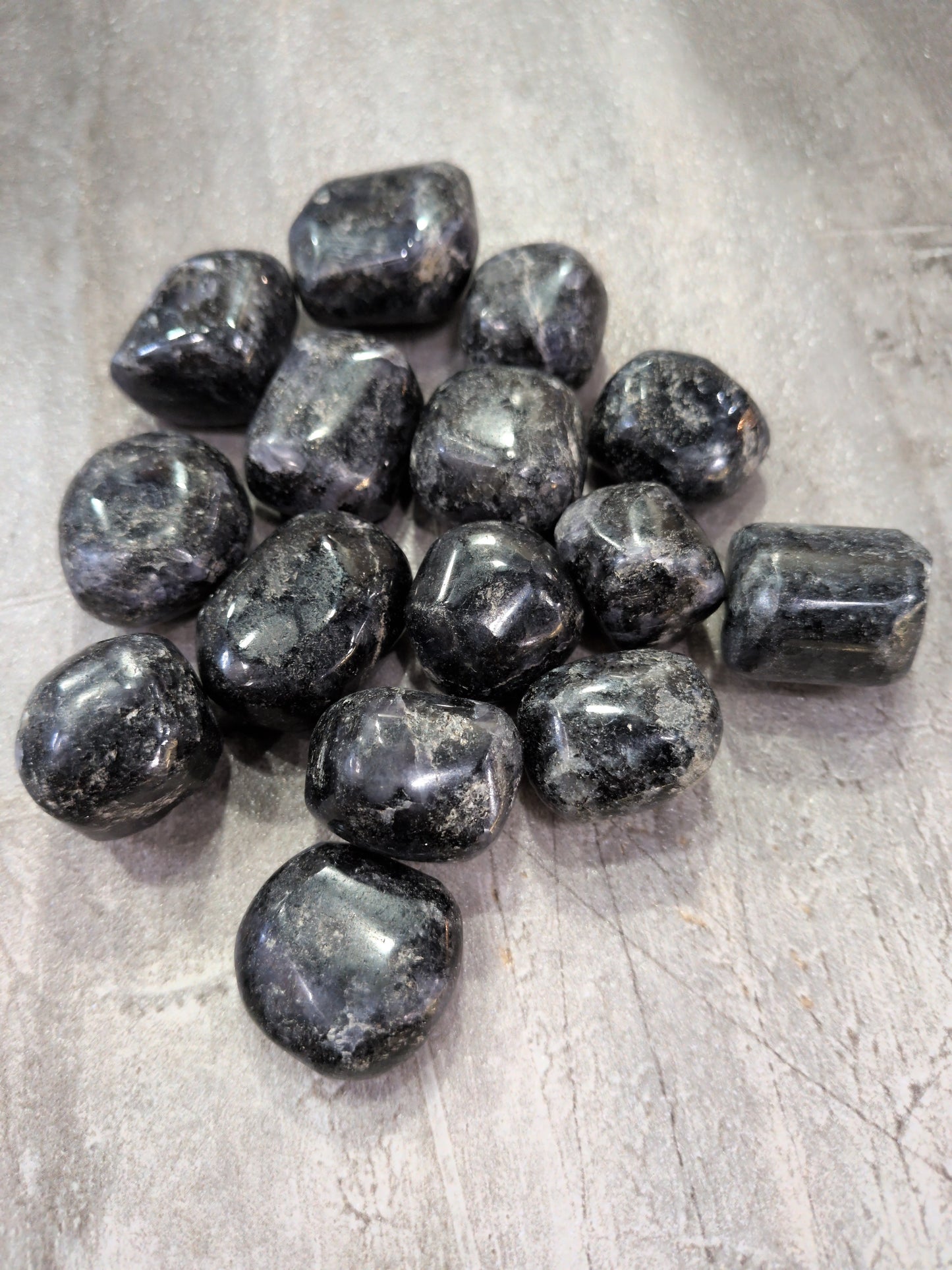 Black Iolite w/ Mica Tumbled stone