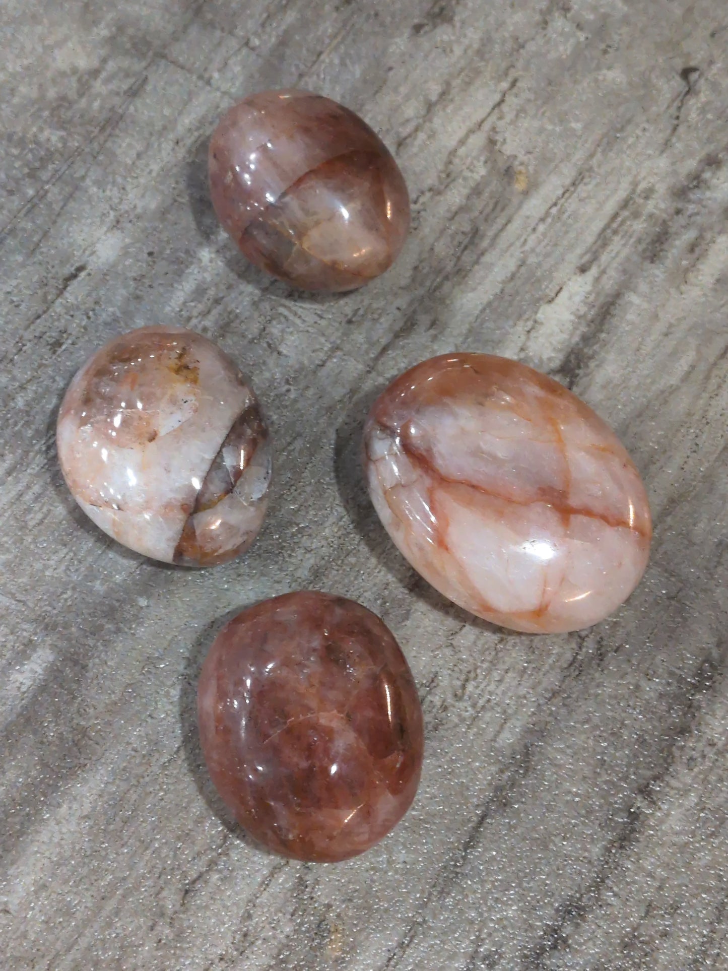 Hematoid Quartz palm stone Priced Each